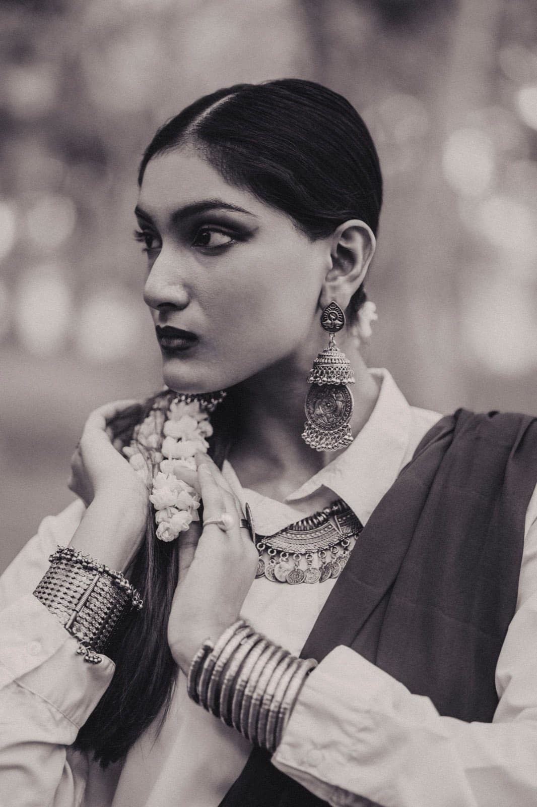 Black and white portrait with silver jewellery