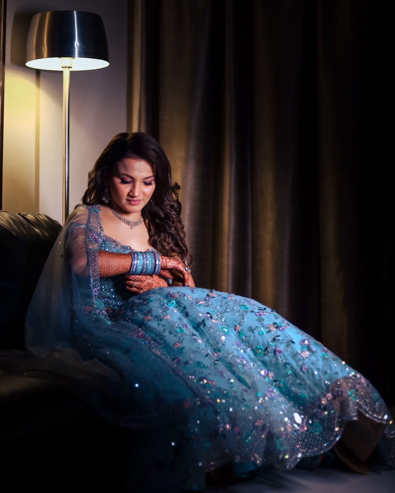 Tara Venkat in a blue sequinned gown
